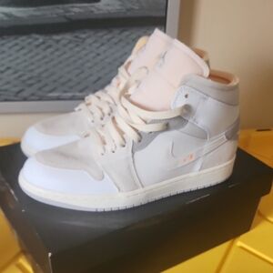 Nike Air Jordans High-Top Sneakers in White and Light Pink Coral
